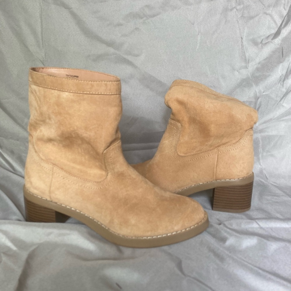 Calf length booties with a 1.5 inch heel